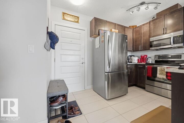 Property Photo: 5151 Windermere Boulevard SW 433 AB T6W 2K4