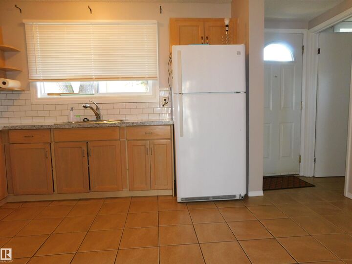Property Photo:  213 Habitat Crescent NW  AB T5A 3K8 