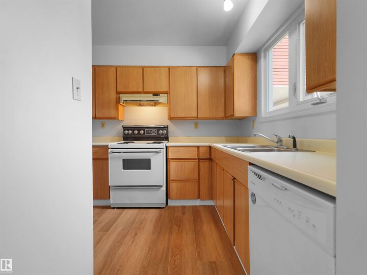 Property Photo:  1904 48 Street NW 50  AB T6L 5H3 