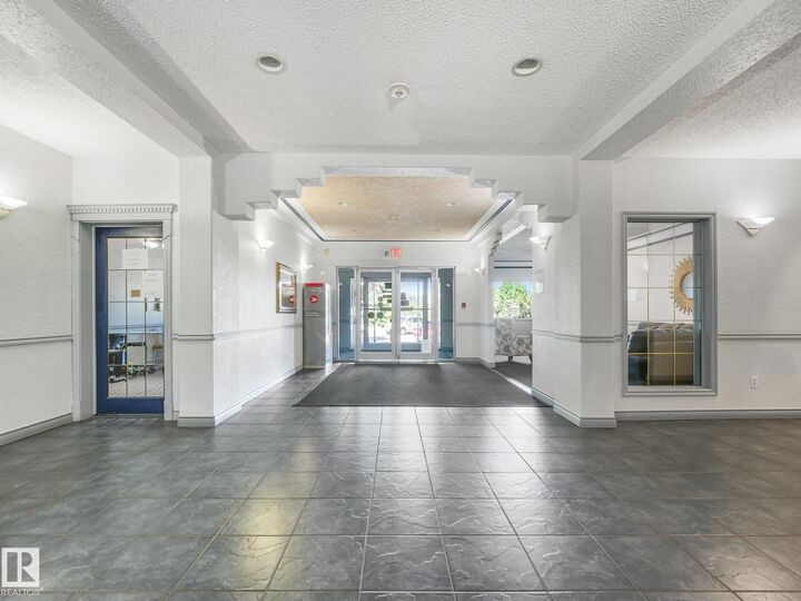 Property Photo:  10511 42 Avenue NW 114  AB T6J 7G8 
