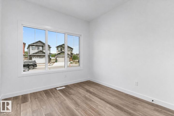 Property Photo:  1621 210A Street NW  AB T6M 3N9 