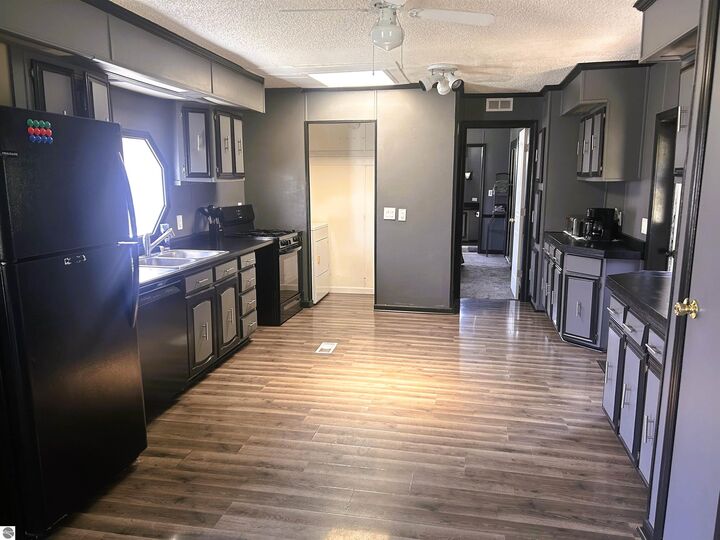 Property Photo: 1147 Barnswood Court MI 48858