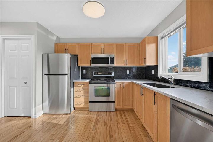 Property Photo: 86 Cedarwood Lane SW AB T2W 6J3