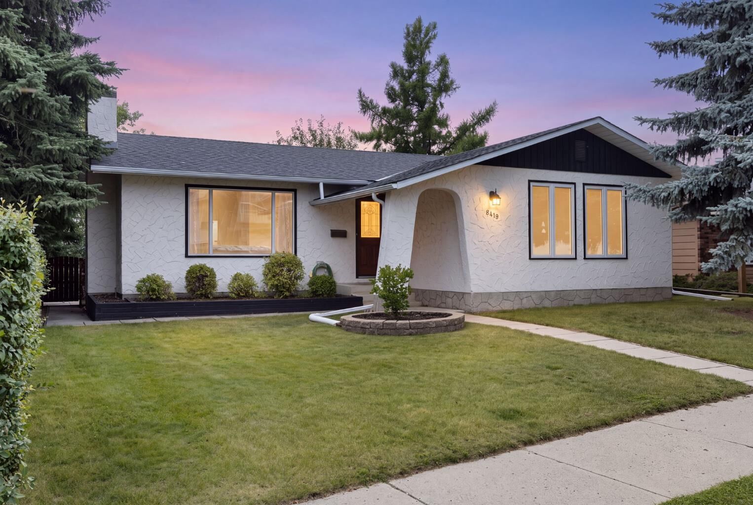 Property Photo: 8419 Silver Springs Road NW AB T3B 4A6