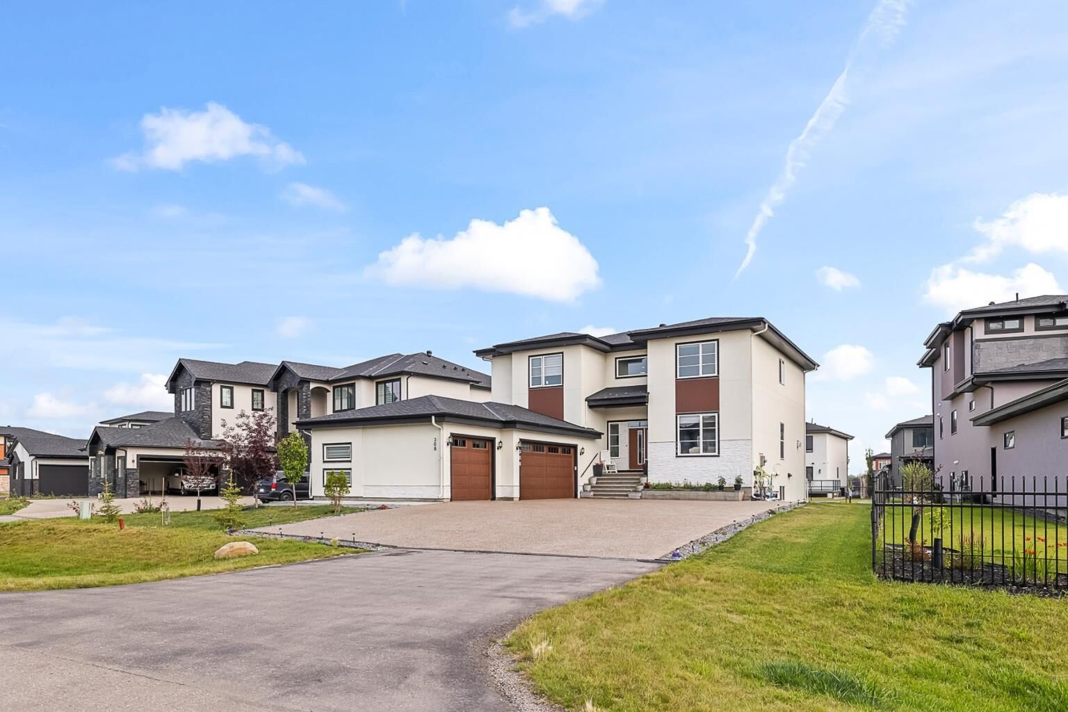 Property Photo: 308 Grange Lane AB T1Z 0B8