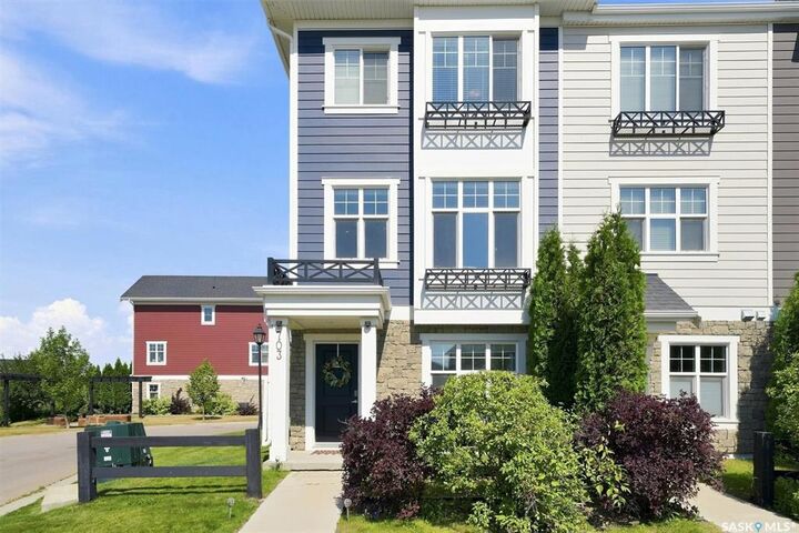 Property Photo: 703 Meadows Boulevard SK S7V 0L3