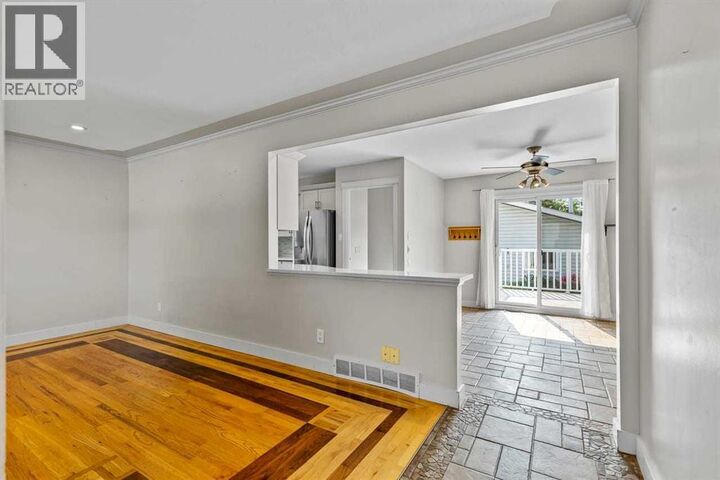 Property Photo:  127 Fredson Drive Southeast  AB T2H 1E2 