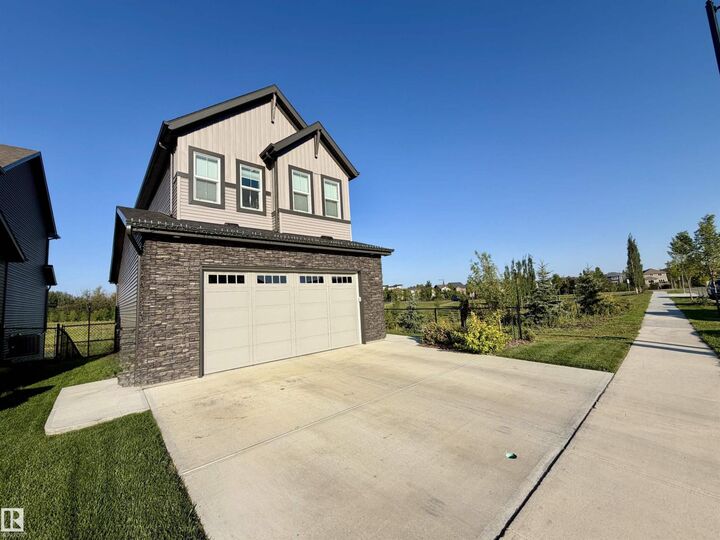Property Photo: 7135 Edgemont Wy NW AB T6M 1K1