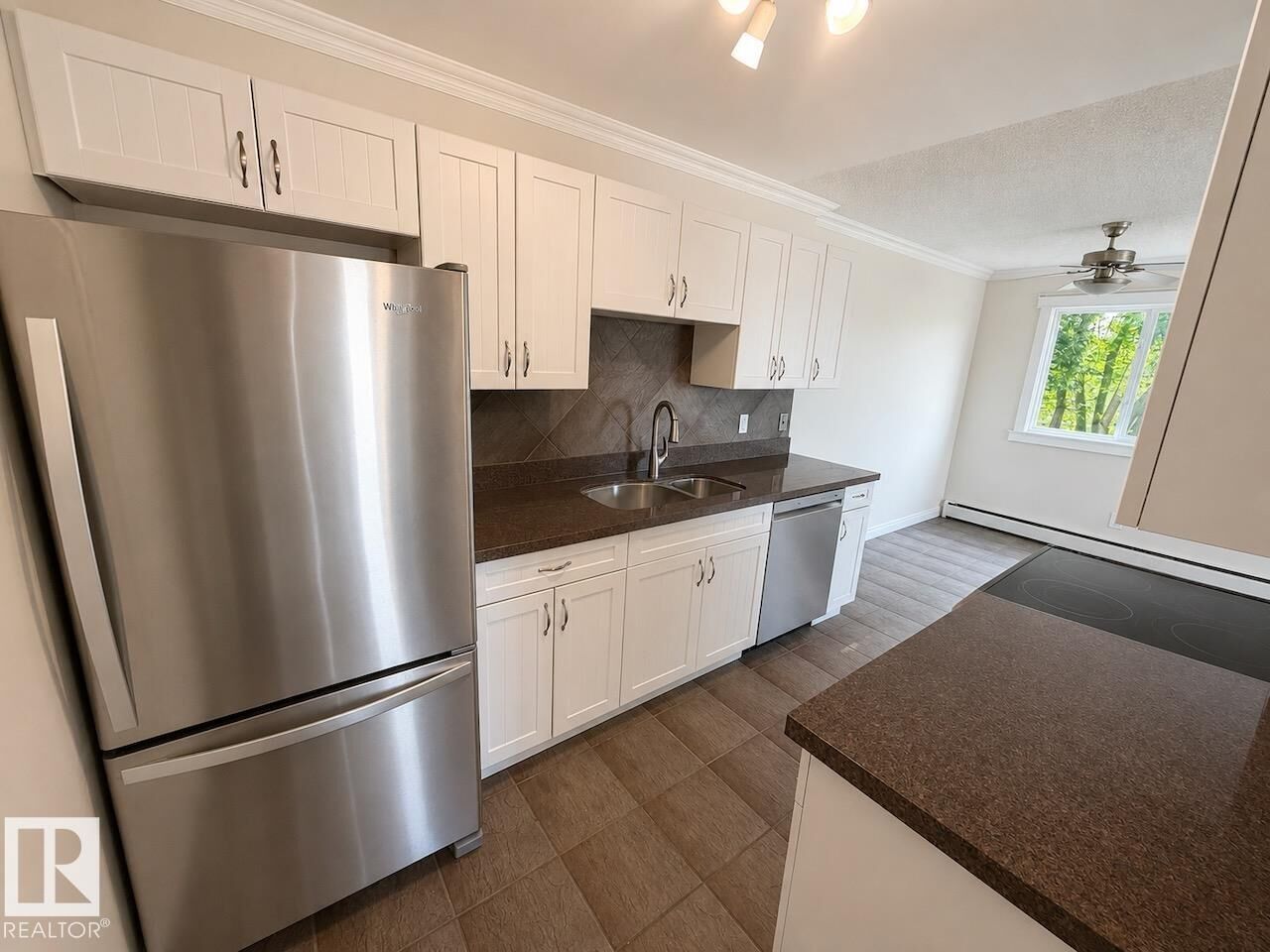 Property Photo:  10904 159 Street NW 9  AB T5P 3C1 
