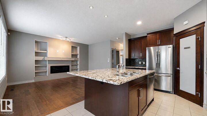 Property Photo:  885 Windermere Wynd NW  AB T6W 2M6 