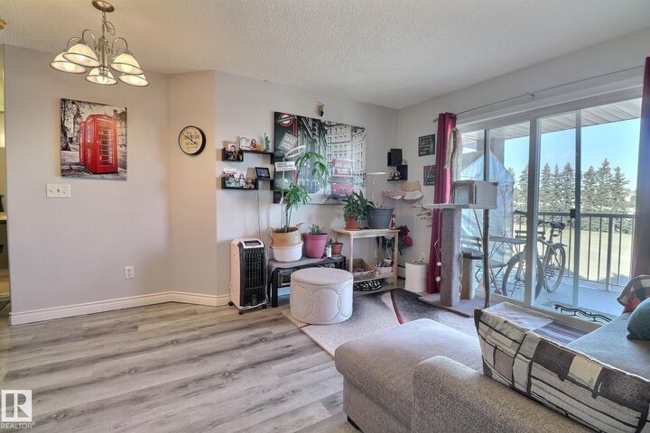 Property Photo:  14708 50 Street NW 416  AB T5A 5G9 
