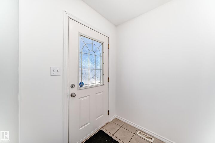 Property Photo:  11727 83 Street NW  AB T5B 2Z1 