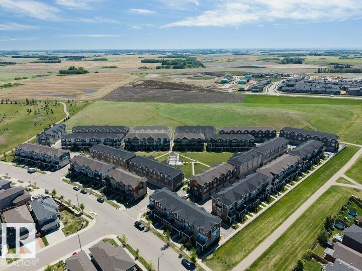 Property Photo: 2072 Wonnacott Way SW 105 AB T6X 2V7