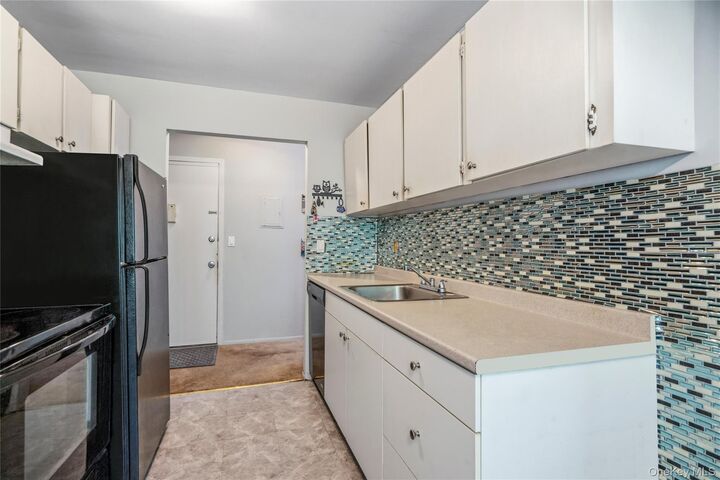 Property Photo:  2453 Union 20B  NY 11751 