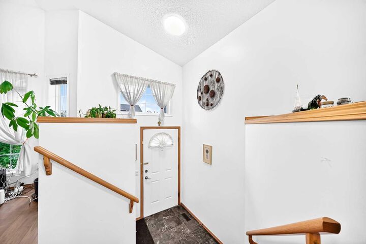 Property Photo: 98 Country Hills Heights NW AB T3K 4Y6