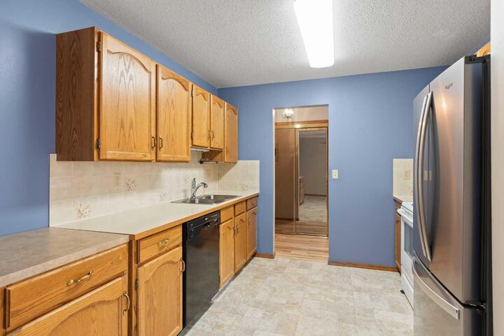 Property Photo: 410 7 Street SW 202 AB T1V 1B7