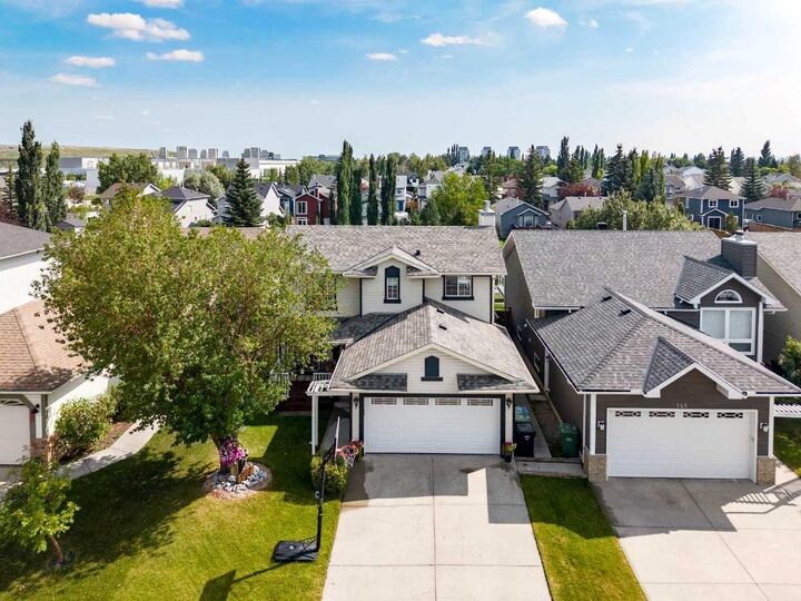 Property Photo: 144 Riverstone Crescent SE AB T2C 4A3