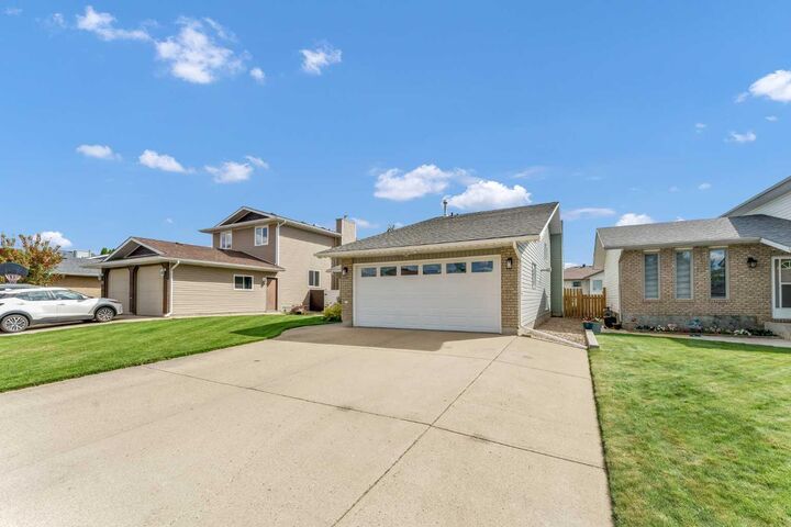Property Photo: 29 Rice Drive SE AB T1B 3X2