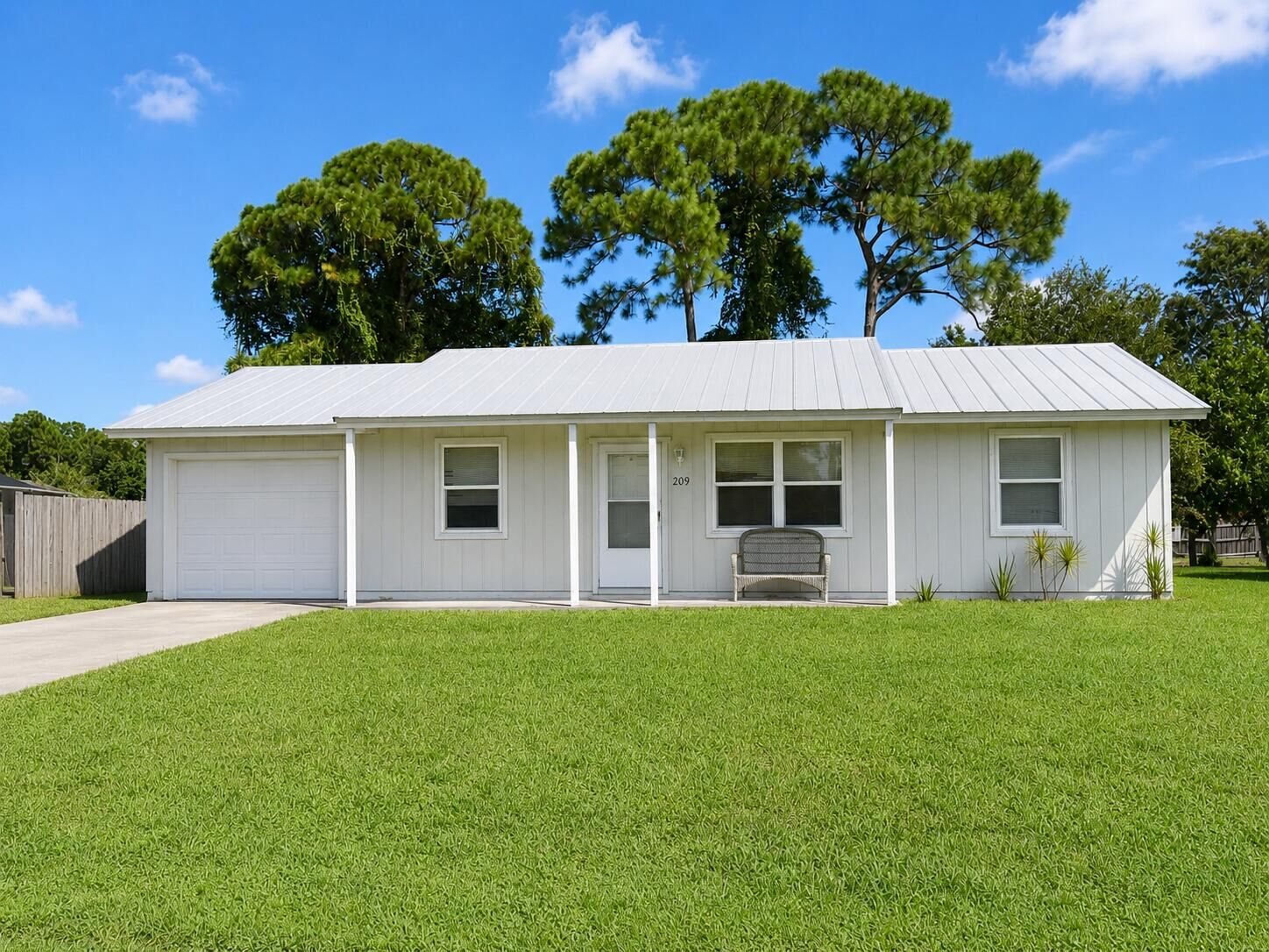 Property Photo: 209 SW Chapman Avenue FL 34984