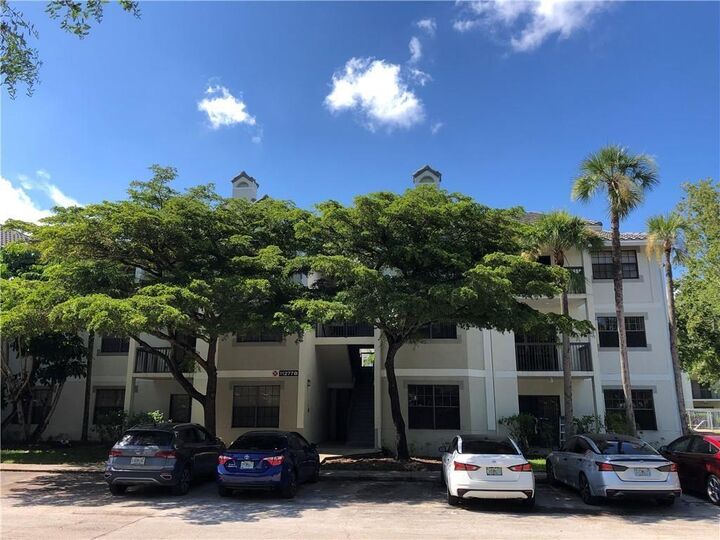 Property Photo:  11277 W Atlantic Boulevard 206  FL 33071 