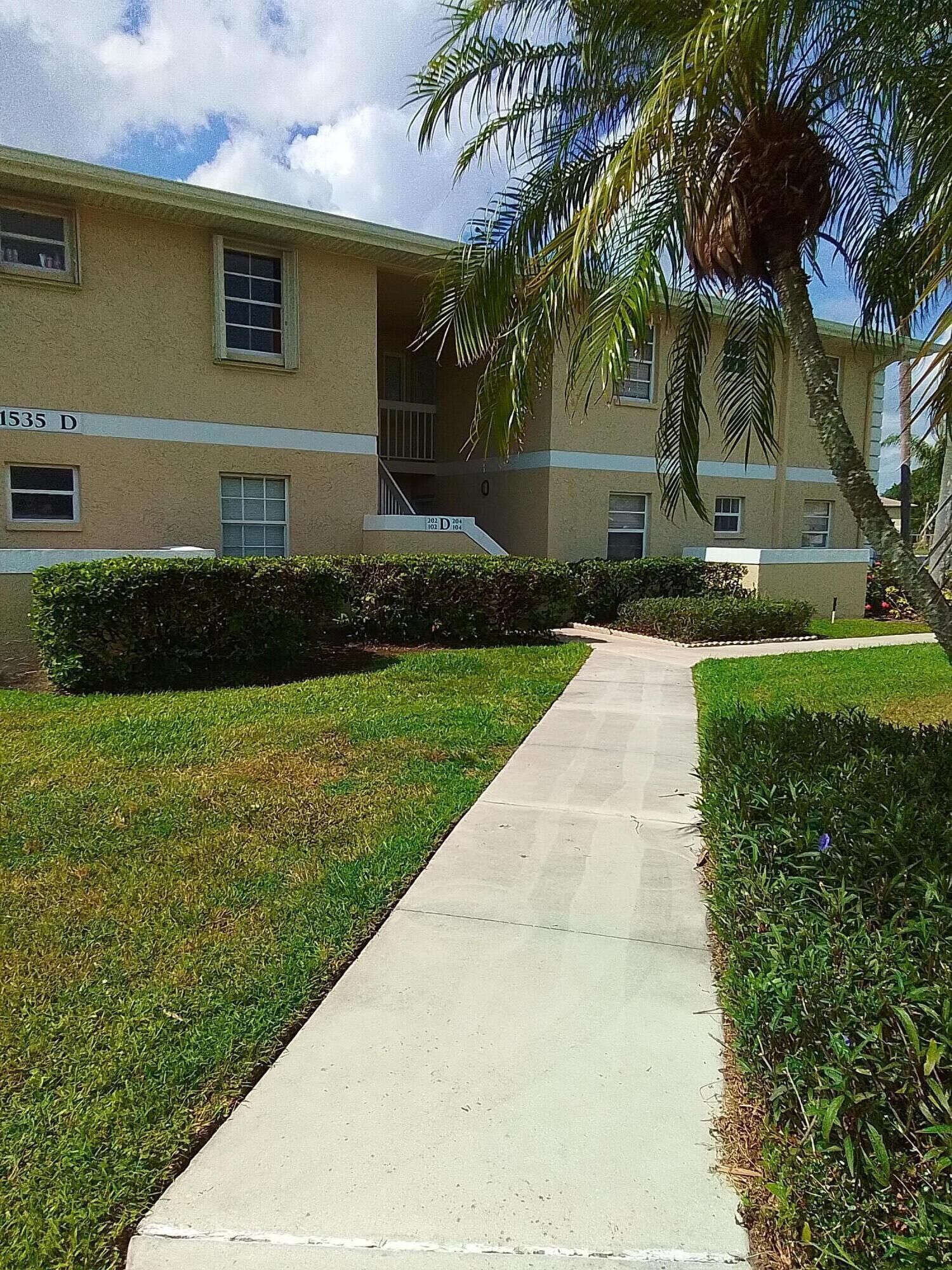 Property Photo:  1535 SE Royal Green Circle D102  FL 34952 