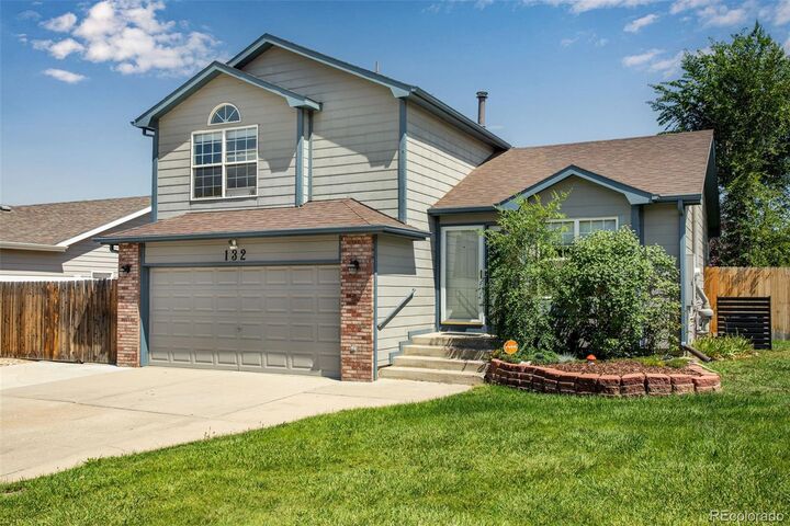 Property Photo: 132 N 50th Avenue Place CO 80634