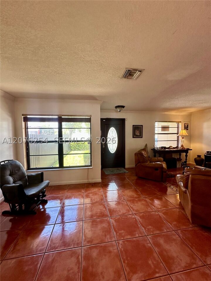 Property Photo: 10330 Puerto Rico Dr FL 33189