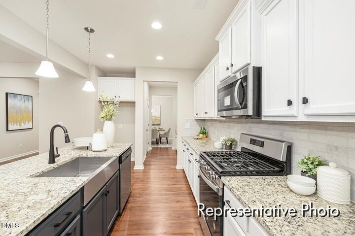 Property Photo:  1216 Madingley Place 62  NC 27591 