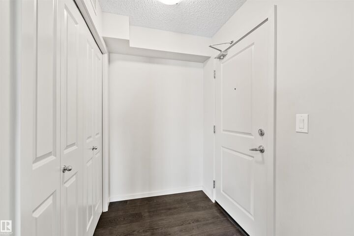 Property Photo: 5521 7 Avenue SW 318 AB T6X 2A8