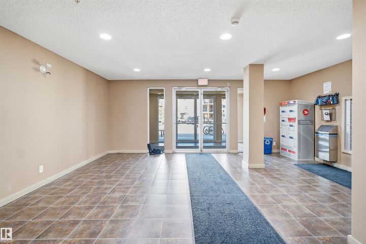 Property Photo:  12035 22 Avenue SW 212  AB T6W 2X9 