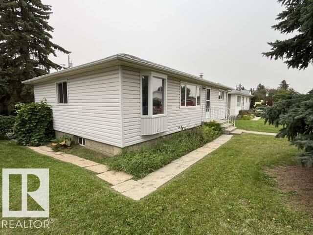 Property Photo: 10332 47 Street NW AB T6A 1Z7