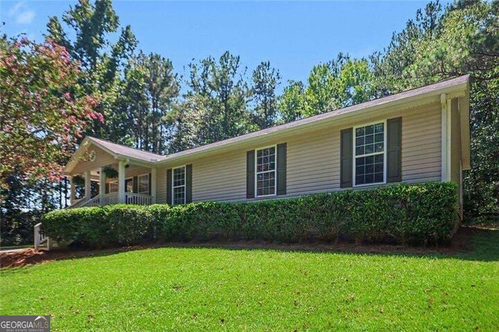 Property Photo:  7290 State Rte 5  GA 30135 