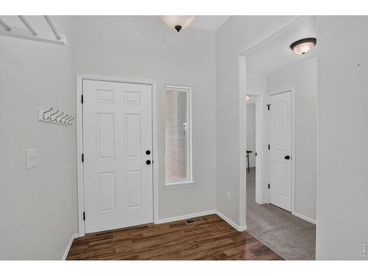 Property Photo:  703 Cavern St  CO 80550 