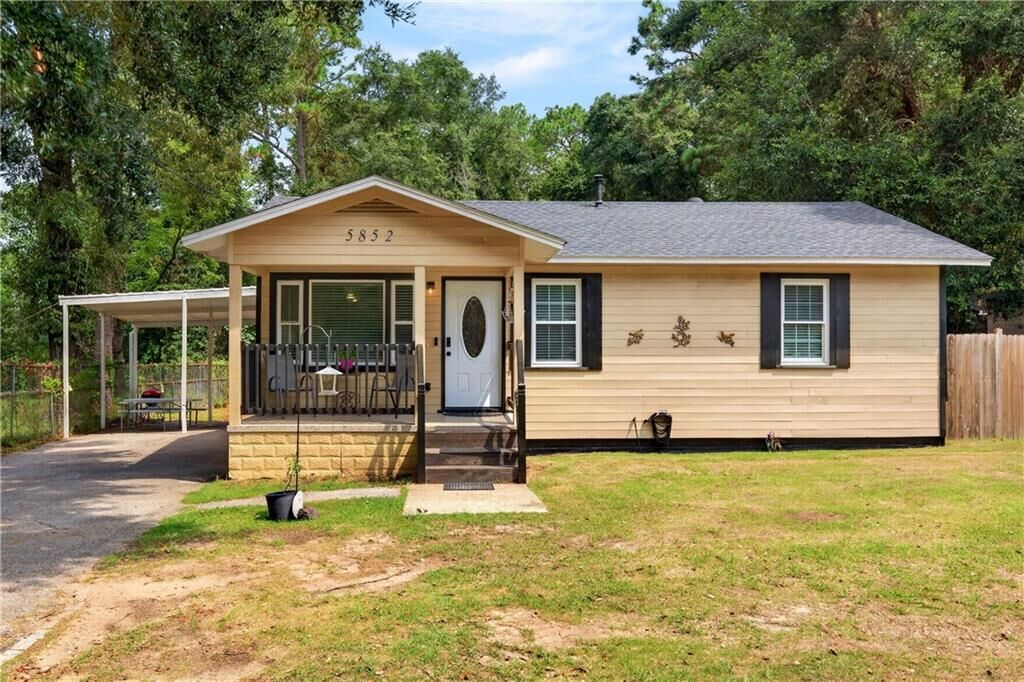 Property Photo: 5852 University Avenue AL 36618