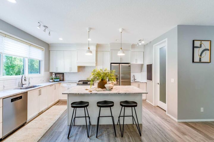 Property Photo: 42 West Grove Way SW AB T3H 1Y8