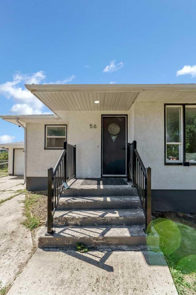Property Photo:  56 Robertson Way SW  AB T1A 5J2 