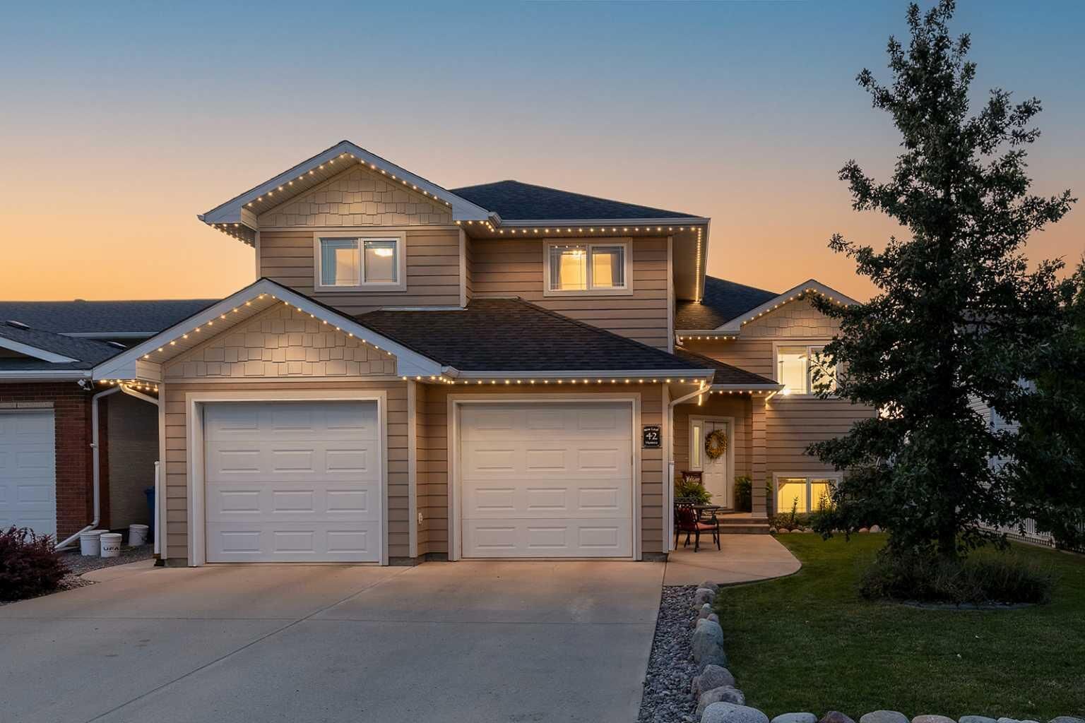 Property Photo: 42 Somerset Way SE AB T1B 0C1