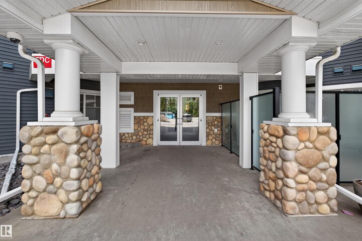 Property Photo:  6084 Stanton Drive SW 215  AB T6X 0Z4 