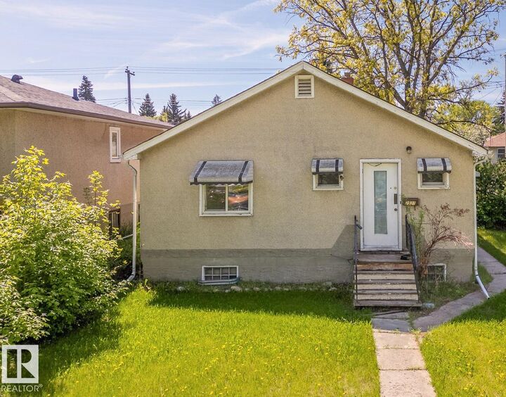 Property Photo:  7931 83 Avenue NW  AB T6C 0M1 