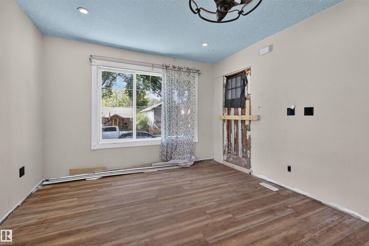 Property Photo:  11327 89 Street NW  AB T5B 3T5 