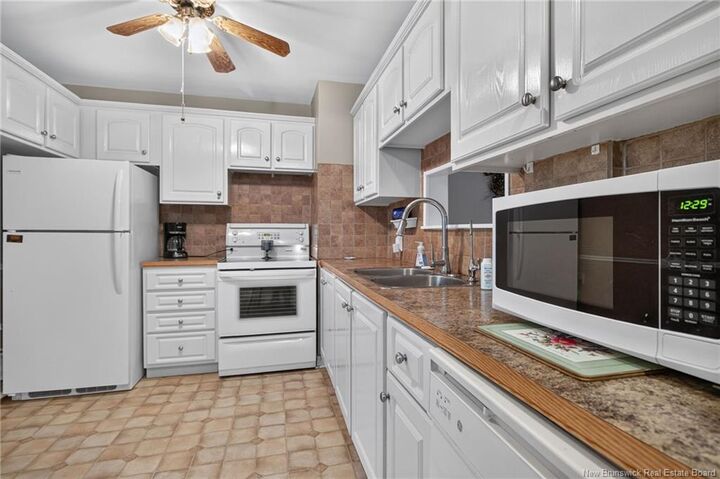 Property Photo:  210 Blythwood Avenue  NB E1B 2G8 