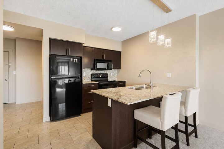 Property Photo:  8880 Horton Road SW 806  AB T2V 2W3 