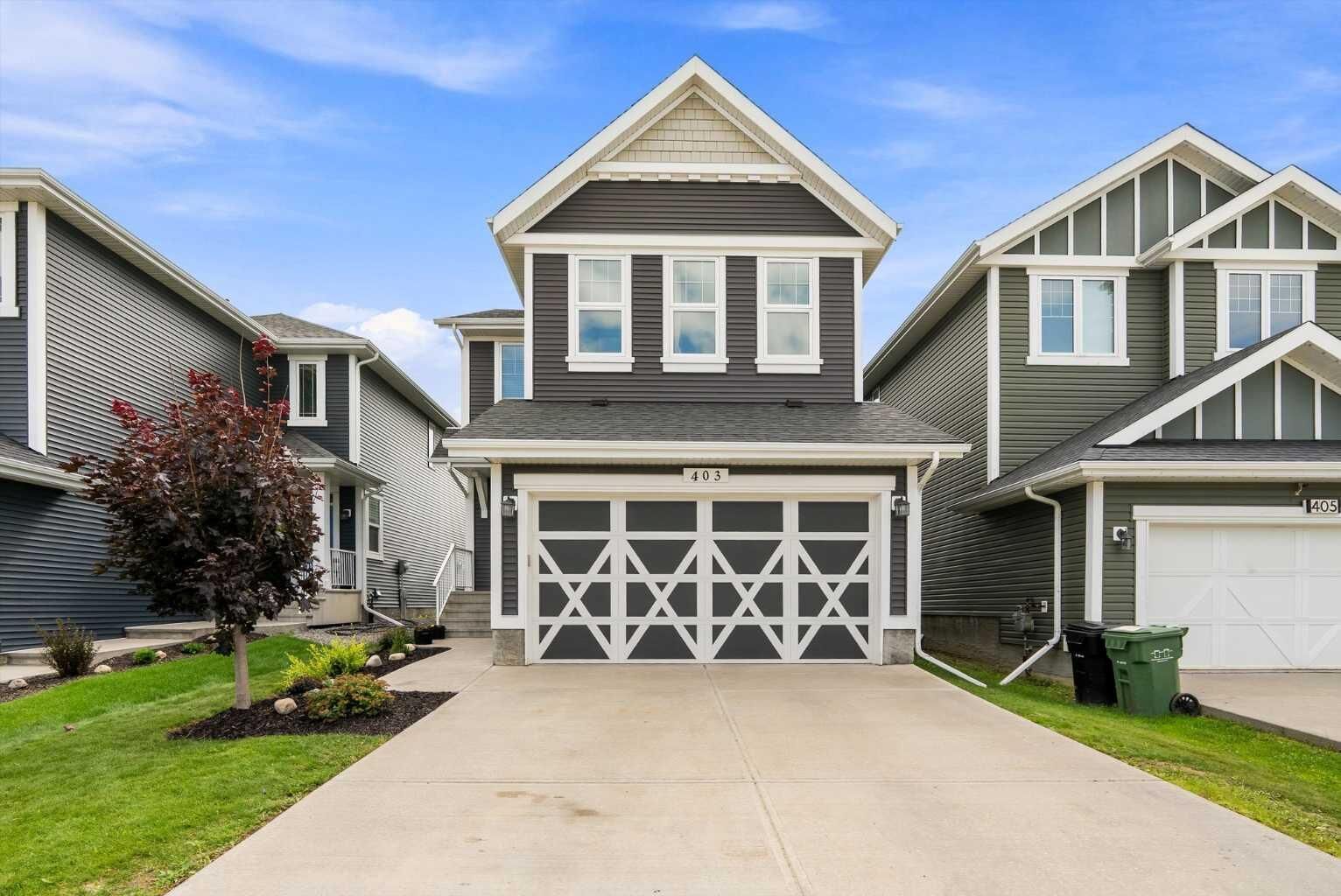 Property Photo:  403 Simpkins Wynd  AB T9E 0Y3 