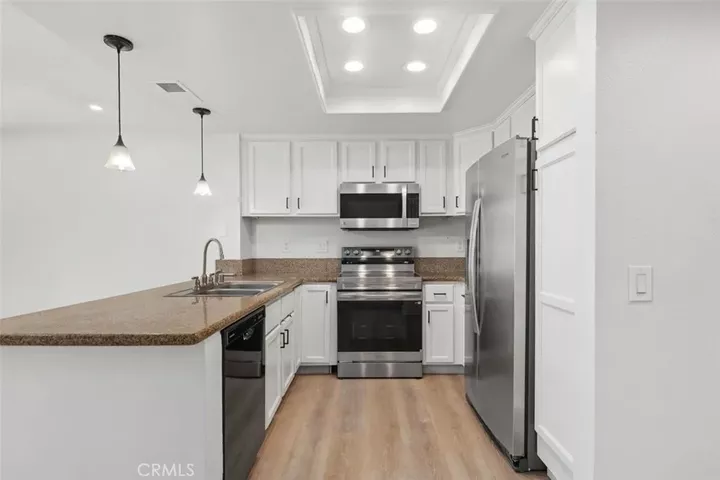 Property Photo:  142 Stanford Court 71  CA 92612 