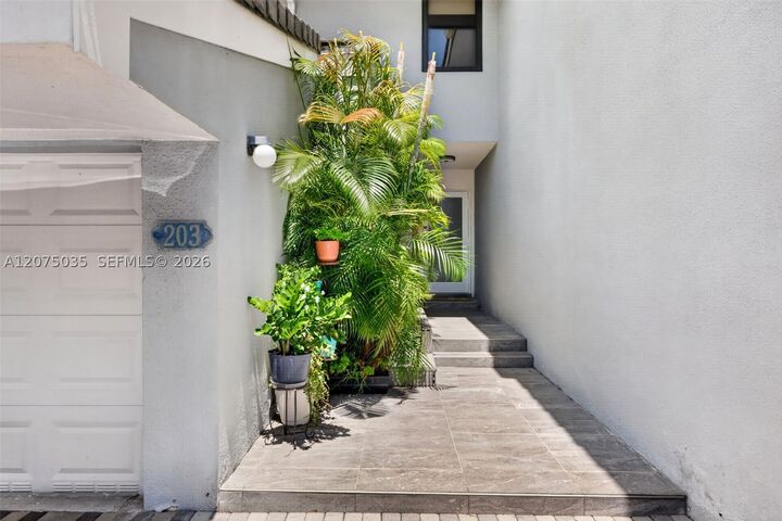 Property Photo:  203 Poinciana Dr 103  FL 33160 
