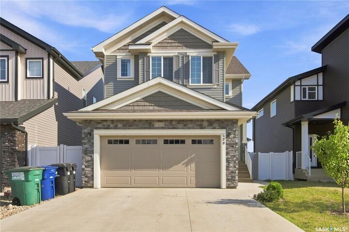 Property Photo: 450 Aniskotaw Way SK S7V 1M3
