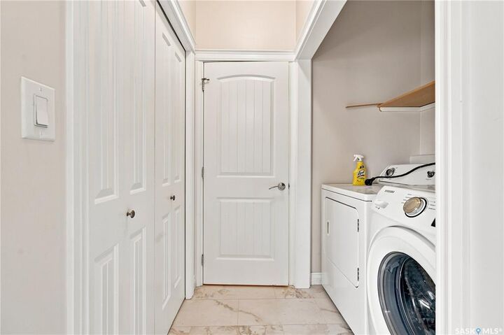 Property Photo: 119 Hampton Circle 107 SK S7R 0A8
