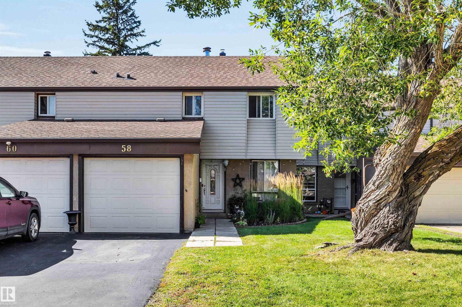 Property Photo:  58 Grandin Village  AB T8N 1R9 
