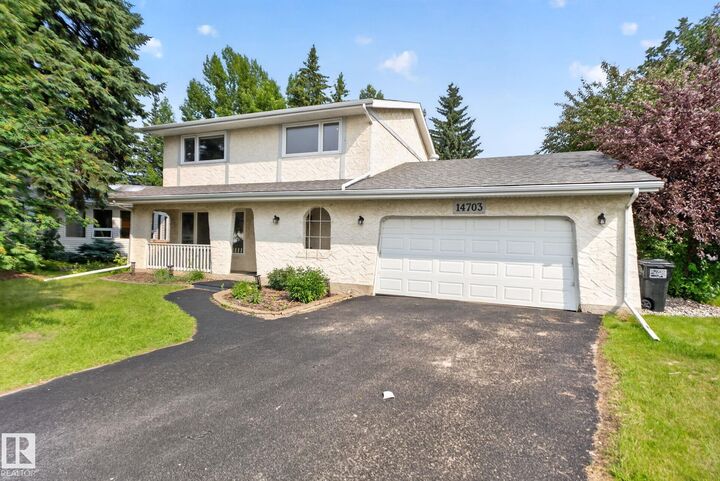 Property Photo: 14703 58 Ave NW AB T6H 4T3