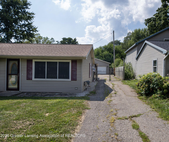 Property Photo: 38 S Aurelius Road MI 48854